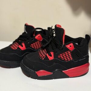 Jordan 4 Black and Red Sneakers with Suede Upper